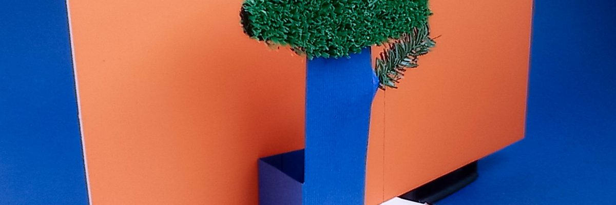 vue de côté pop-up arbre avec un long mur