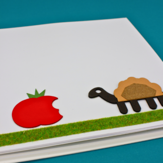 Illustration tactile d'une tortue et d'une tomate croquée